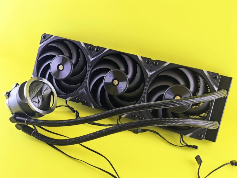 High-performance CPU cooler with a triple fan radiator on yellow background, ideal for PC upgrades.