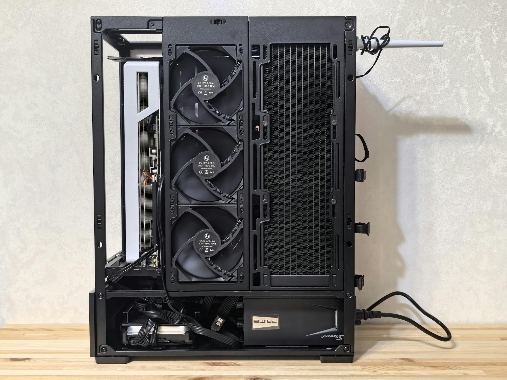 High-resolution image of a custom-built desktop computer with visible cooling system.